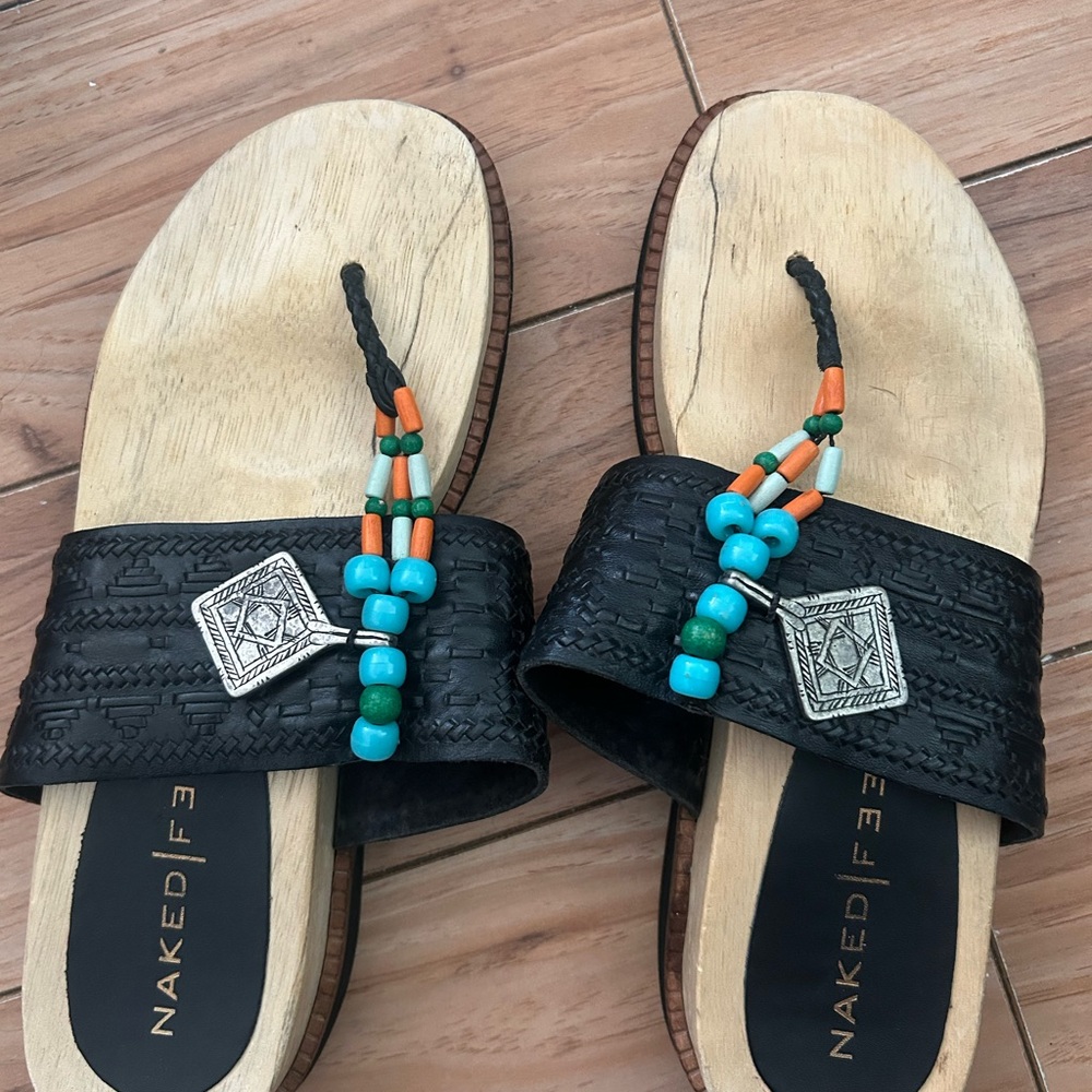 Naked Feet Black and Orange Sandals with Vibrant Design
